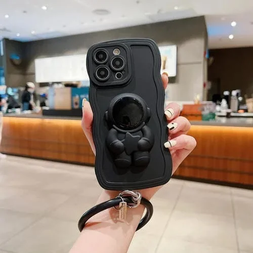 Funda para iPhone 11 Pro 3D Astronaut Holder Skin-Feel Silicone con Muñequera (Negro)