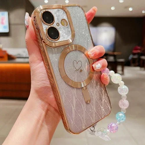 Funda para iPhone 16 Plus TPU con Purpurina Degradada Hojas de Amor Fibra de Carbono Magsafe (Dorada)