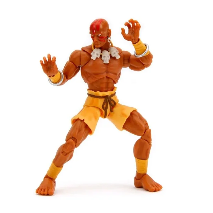 Jada – Street Fighter 2- Figura articulada de Dhalsim de 15 cm. con Manos y Cabeza Intercambiables, Accesorios y 20 Puntos articulados. A Partir de 13 años (253252031)