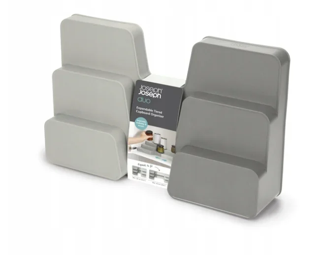 Organizador escalonado extensible Joseph Joseph Duo para armarios, optimiza espacio, diseño flexible y accesible, ideal para utensilios de cocina, limpieza y baño.
